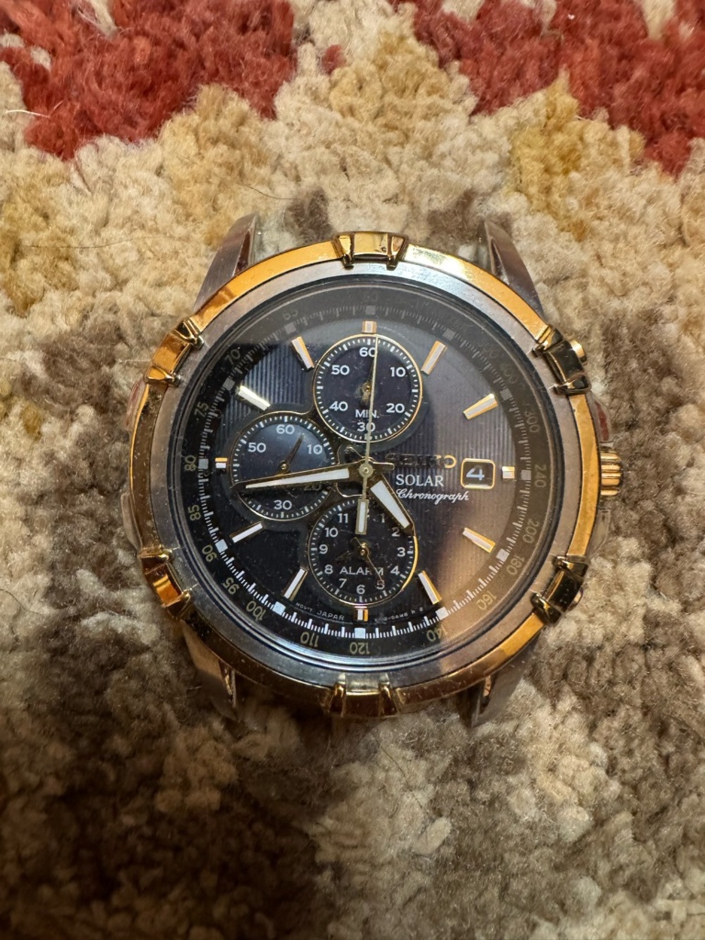 Seiko Black and Gold Solar Chronograph Watch Dial